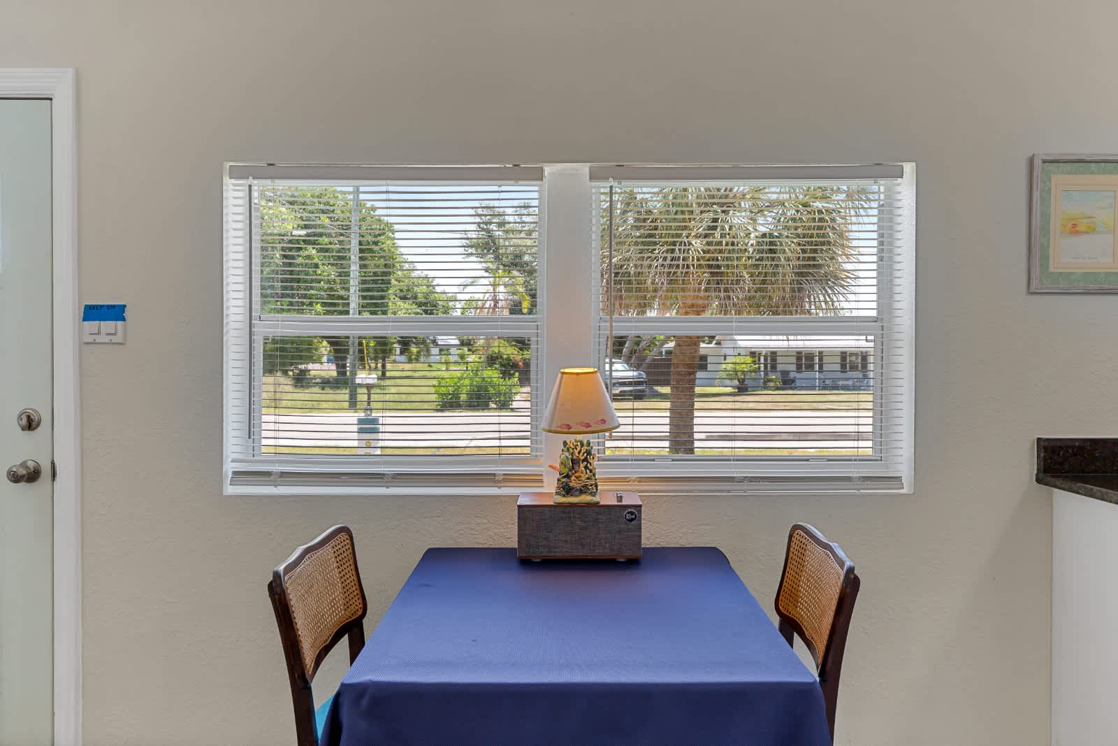 Settle in for a meal at your own dining table, with natural light spilling through the windows and a peaceful view of the surrounding neighborhood.