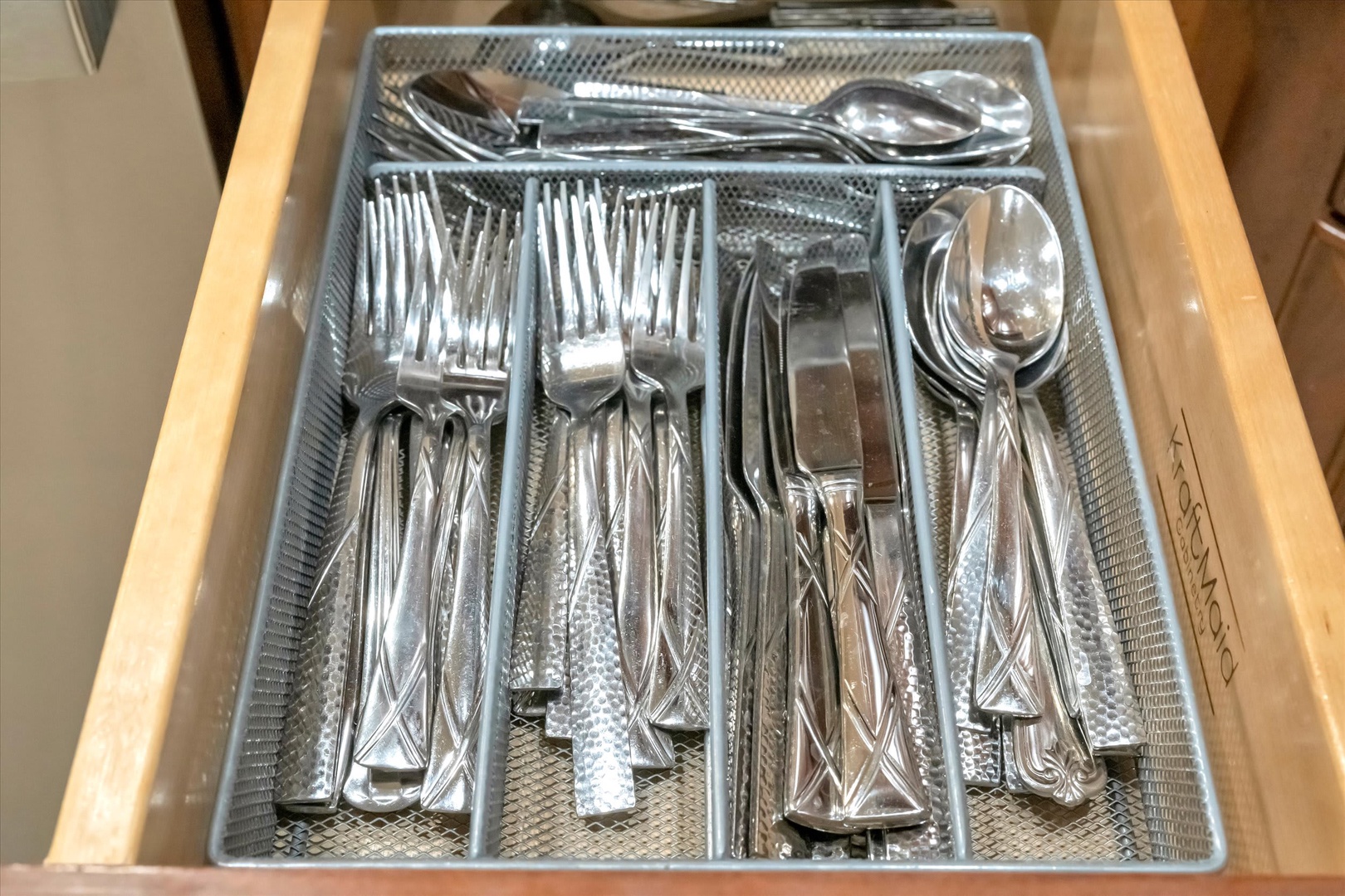 Your kitchen comes fully equipped, right down to the silverware. Everything you need is neatly organized and ready for your meals.