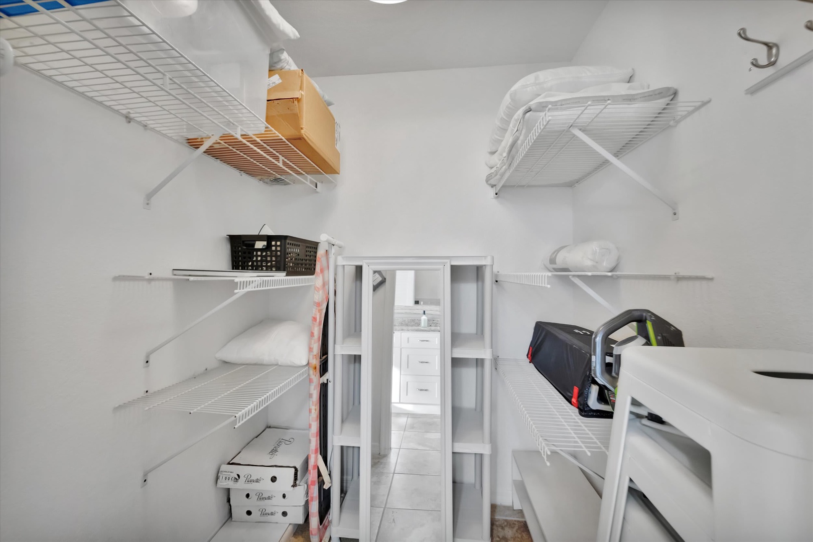 Ample storage shelves keep your belongings organized and easily accessible throughout your stay, with space for luggage and personal items.