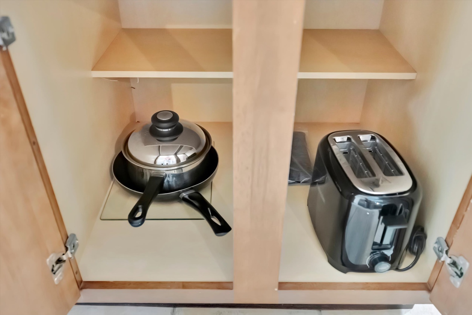 Your rental includes thoughtful touches like a waffle maker and toaster, stored neatly and ready for you to whip up delicious breakfasts at your own pace.