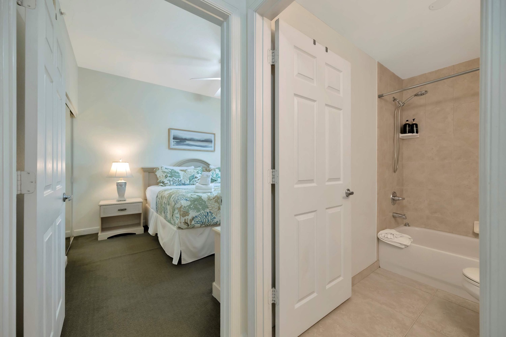 Your private retreat awaits with a soothing bedroom just steps from a clean, well-appointed bathroom featuring a tub-shower combo—perfect for unwinding after a day of adventure.