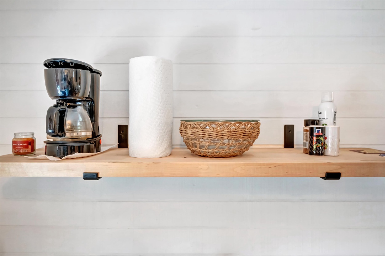 Start your mornings with fresh-brewed coffee from your own counter, where essentials and cozy touches wait for you.
