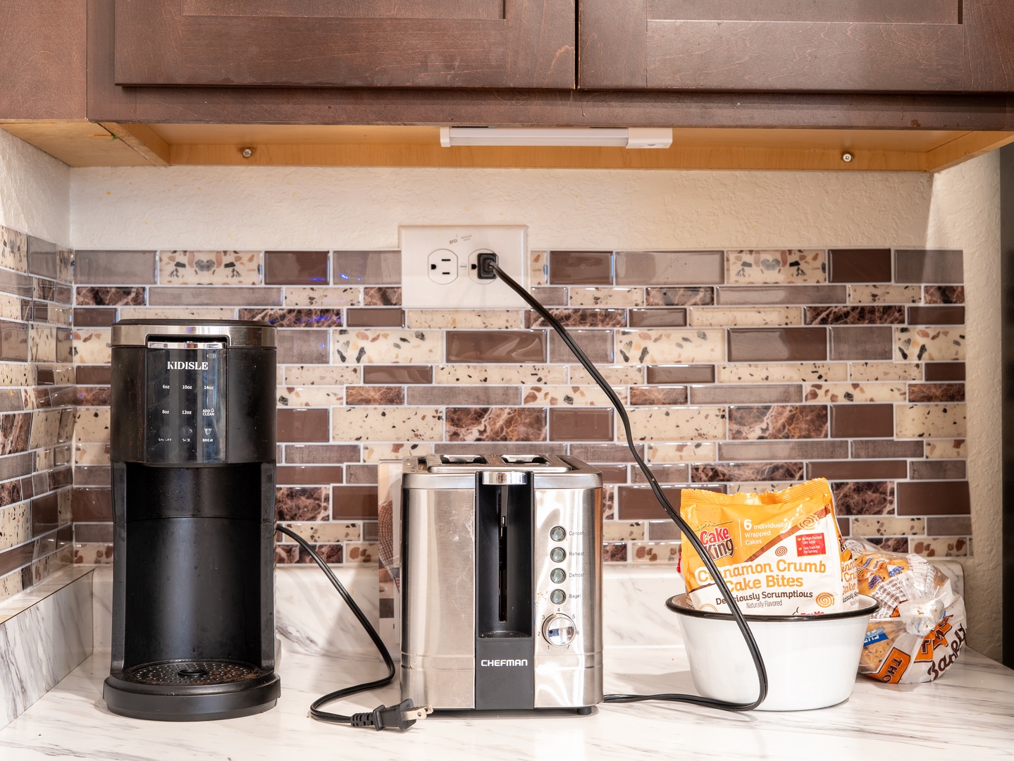Start your mornings right with fresh coffee from your in-room coffee maker and a quick breakfast from your toaster. Everything you need for a convenient stay is right at your fingertips.