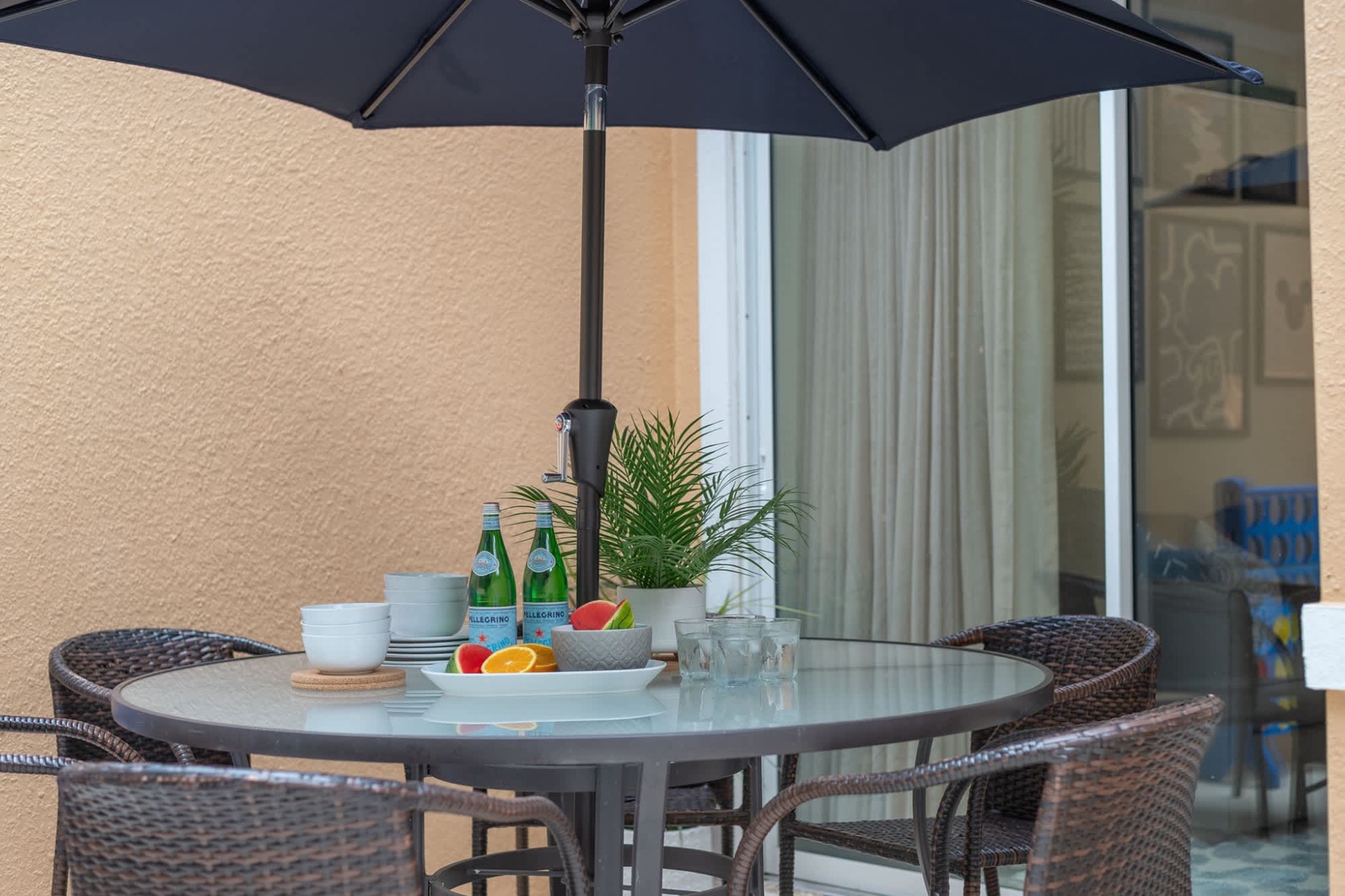 Your private patio invites you to dine al fresco under the shade of an umbrella, with fresh fruit and refreshing drinks awaiting your arrival.