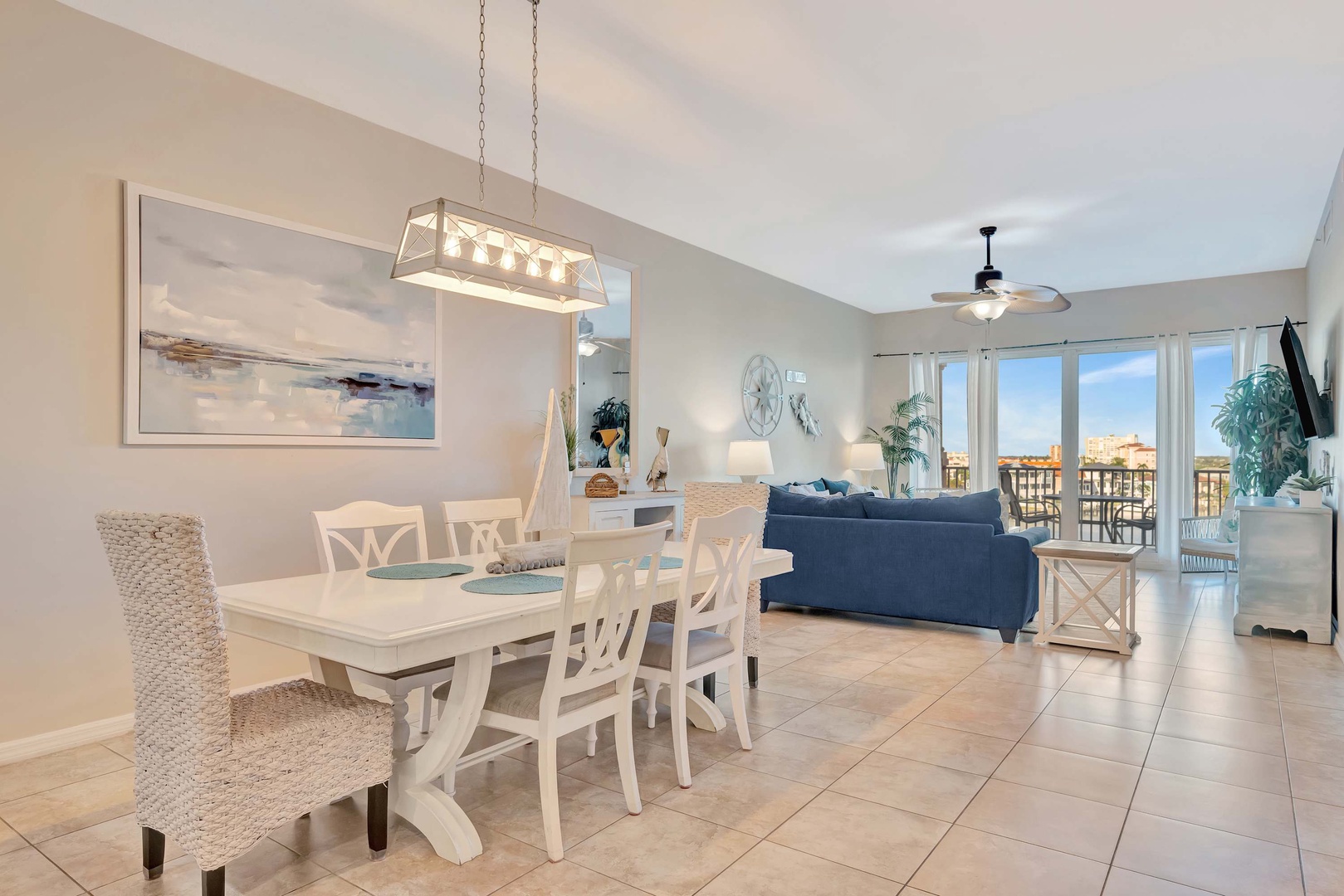 Bright and breezy coastal living awaits you in this open-concept space, where sunlight streams through the windows and tasteful beach-inspired décor invites relaxation.