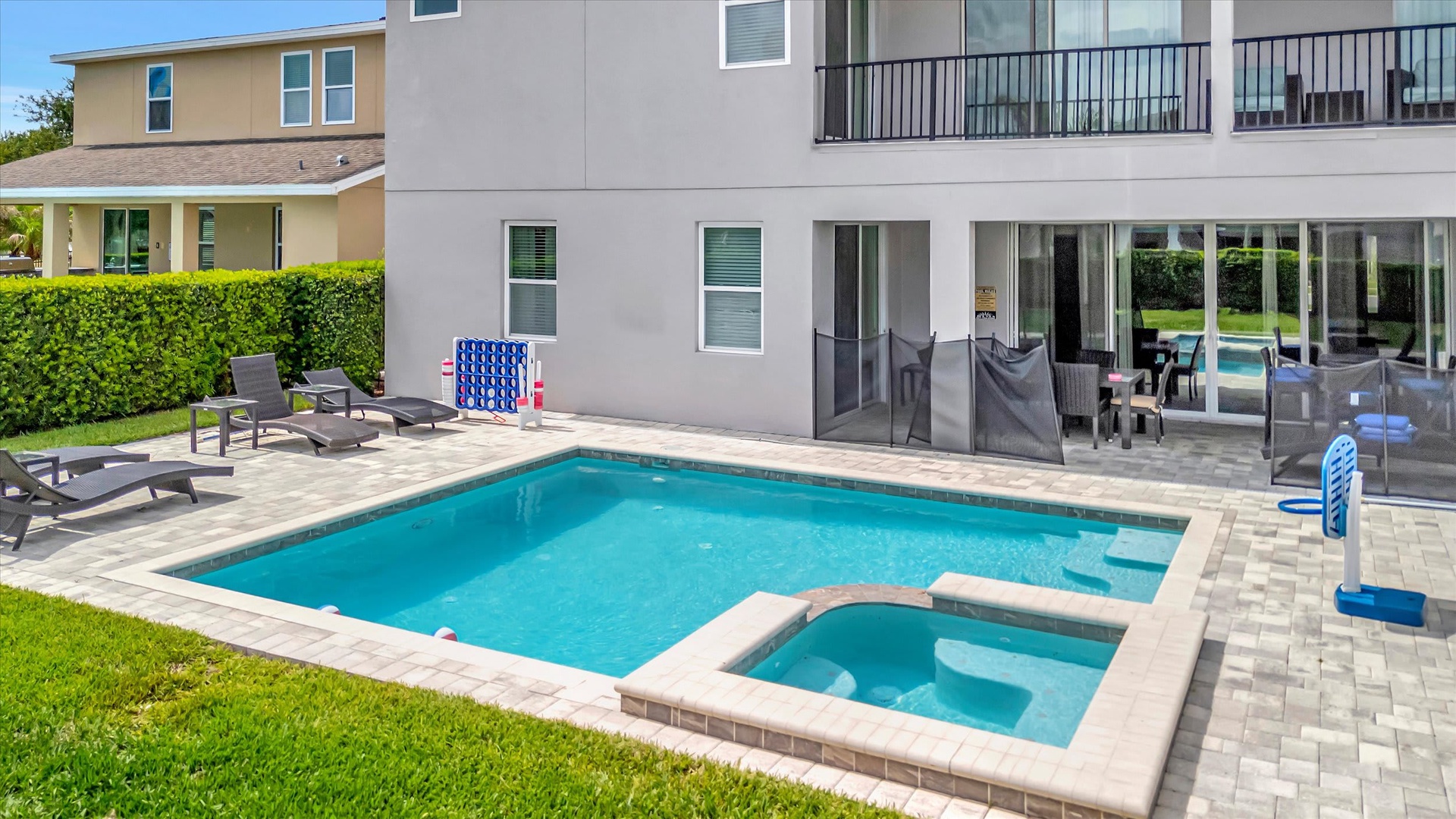 Your private pool and spa await, surrounded by sunny loungers and a spacious patio. Step out from the screened lanai to enjoy endless Florida sunshine in your own backyard oasis.