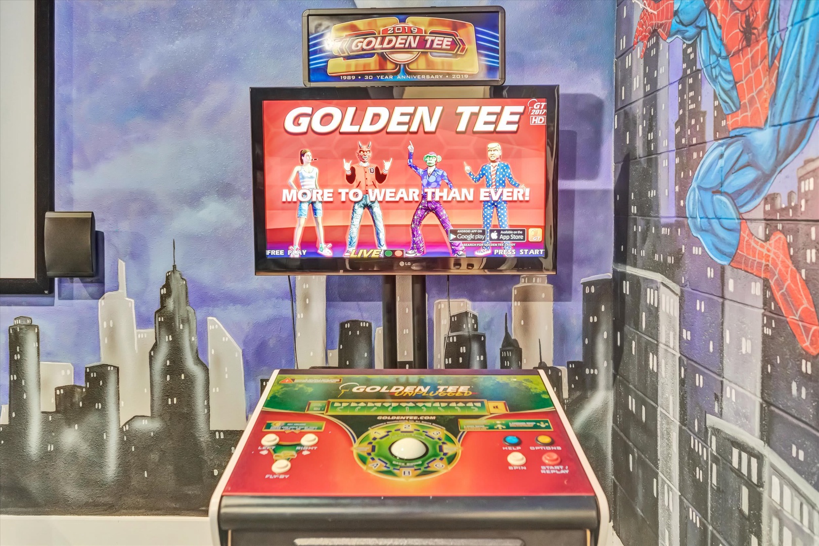 Step into fun with a classic arcade game ready for your entertainment, set against a vibrant cityscape backdrop featuring superhero artwork.