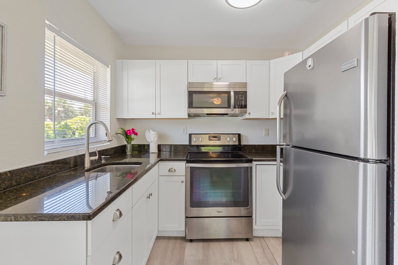 Your fully equipped kitchen makes meal prep effortless, with sleek countertops, stainless steel appliances, and everything you need to whip up your favorite dishes or enjoy a quiet coffee in the morning.