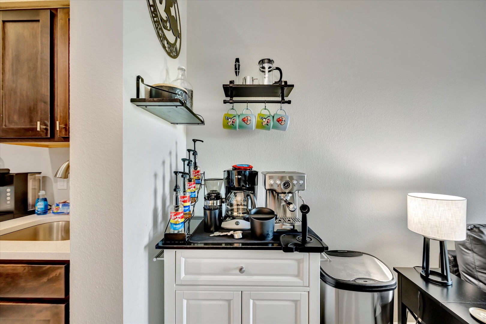 Fuel your mornings at your personal coffee bar, stocked with an espresso machine, grinder, and everything you need to craft your perfect cup before exploring the day.