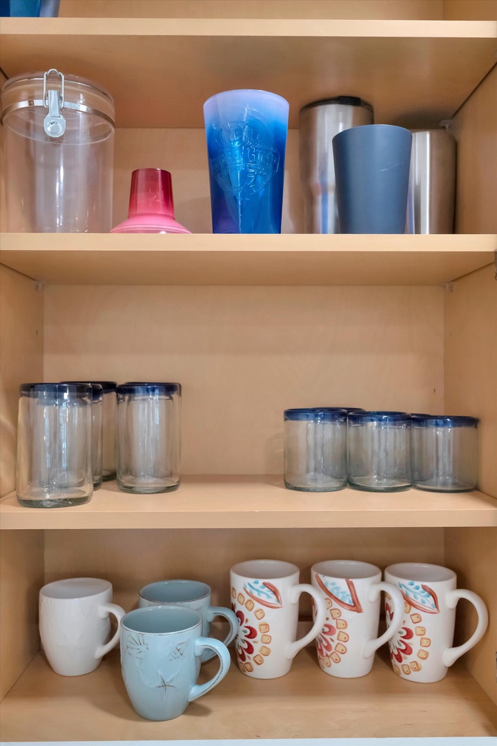 Your kitchen is fully stocked with everything you need—from travel tumblers and festive mugs to glassware for every occasion. Enjoy morning coffee or evening drinks with ease.