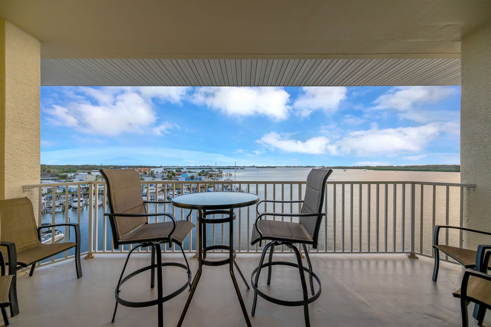 Sip your morning coffee at your private balcony, where the marina unfolds below and a sweeping river view stretches to the horizon. A perfect spot to unwind and watch the boats drift by.