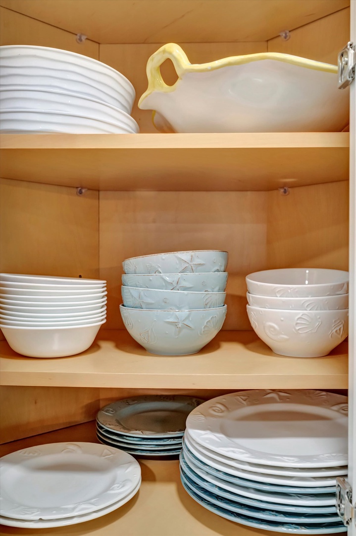 The kitchen is fully stocked with dishes, bowls, and serveware so you can easily prepare and enjoy meals together during your stay.