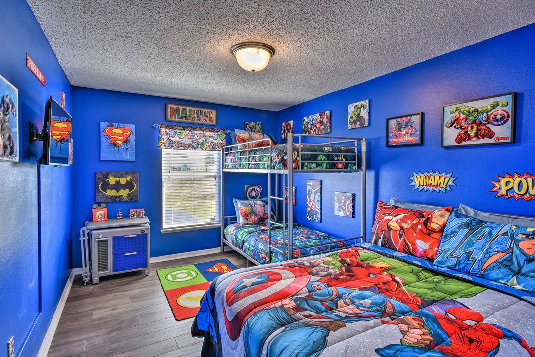 Your little heroes will love this bold, action-packed room featuring bunk beds and cheerful superhero décor that brings their favorite characters to life.