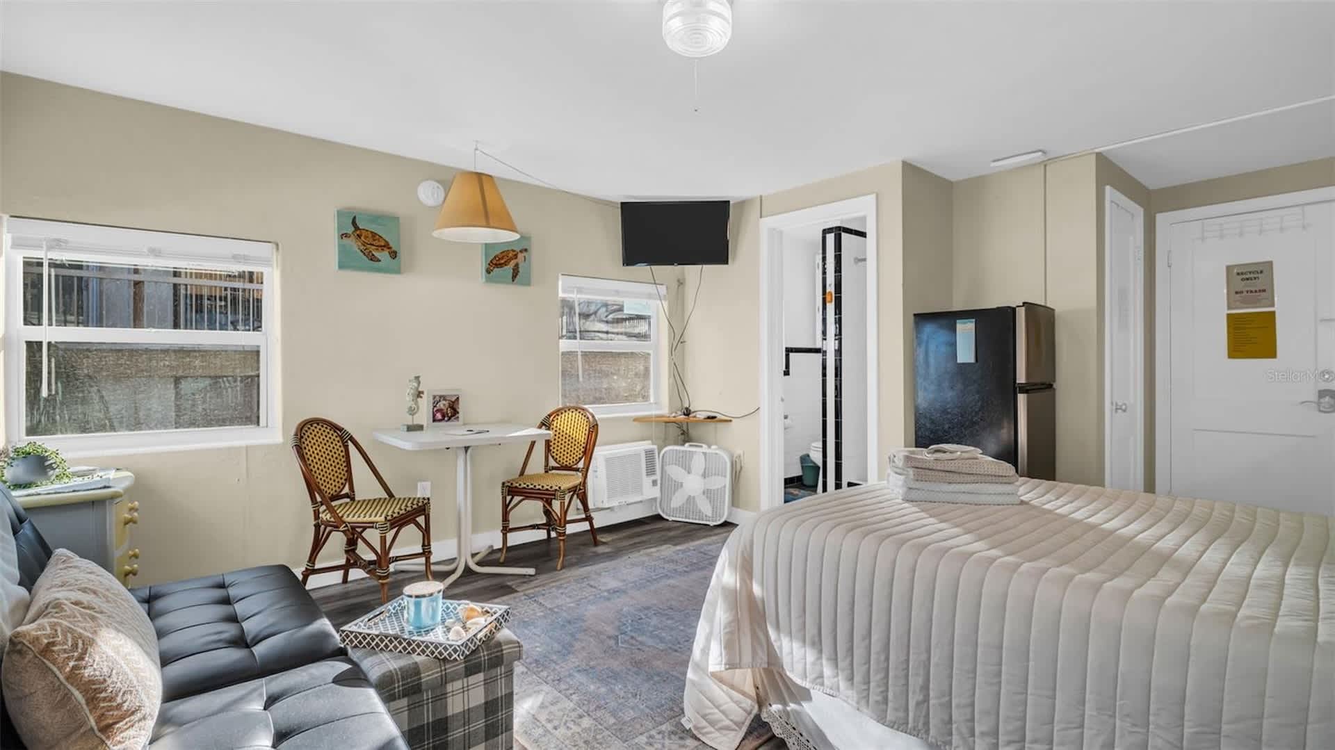 Relax in your bright, thoughtfully designed space with coastal accents, cozy seating, and everything you need for a comfortable stay.