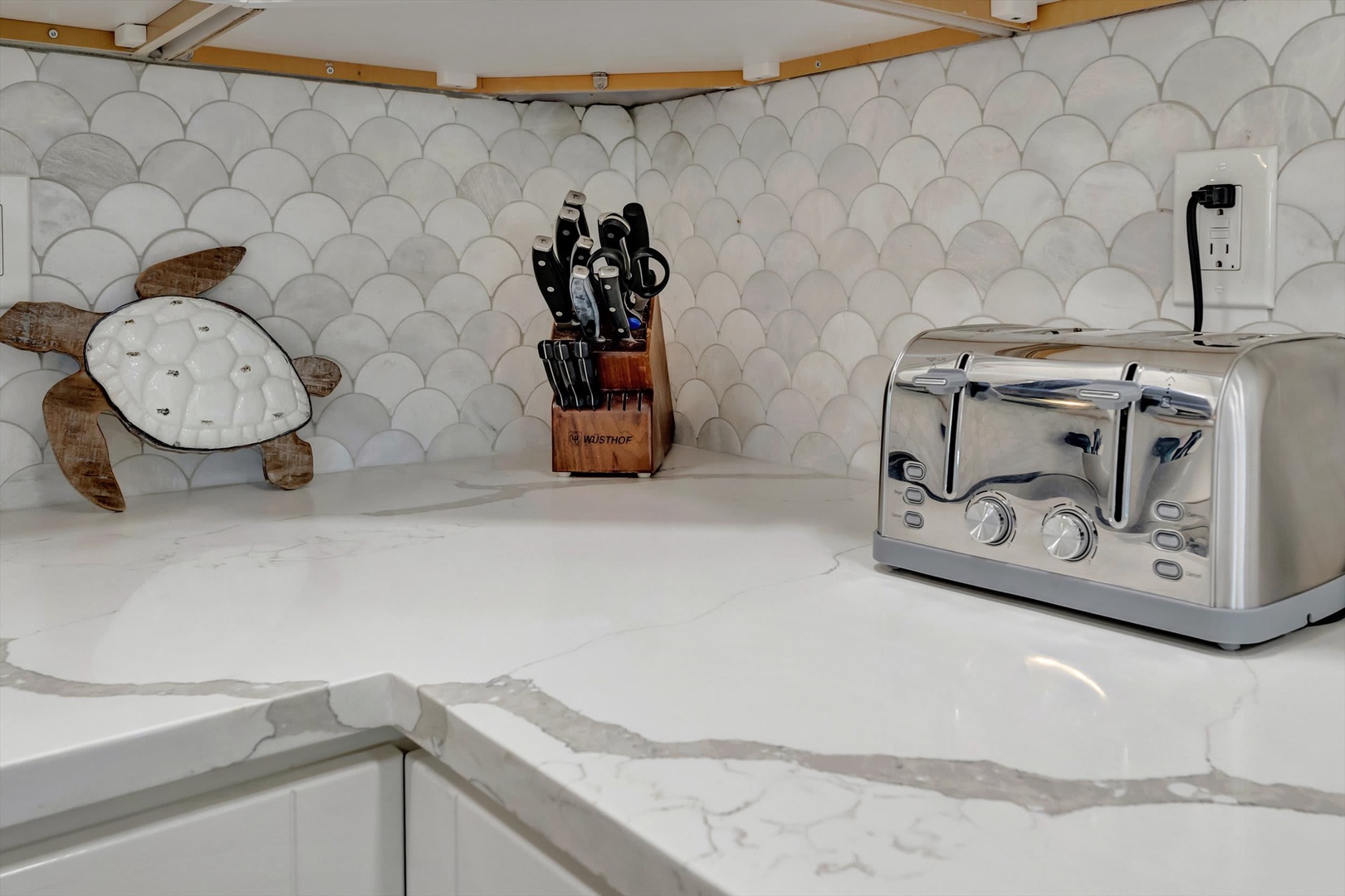 Whip up your morning favorites on beautiful marble countertops, fully equipped with everything you need to feel at home in your vacation kitchen.