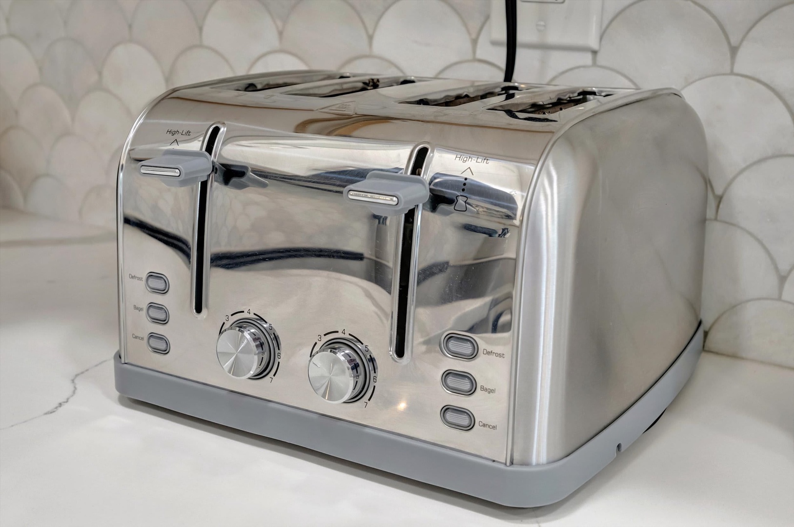 Start your mornings right with this sleek four-slice toaster, making breakfast preparation effortless and convenient during your stay.