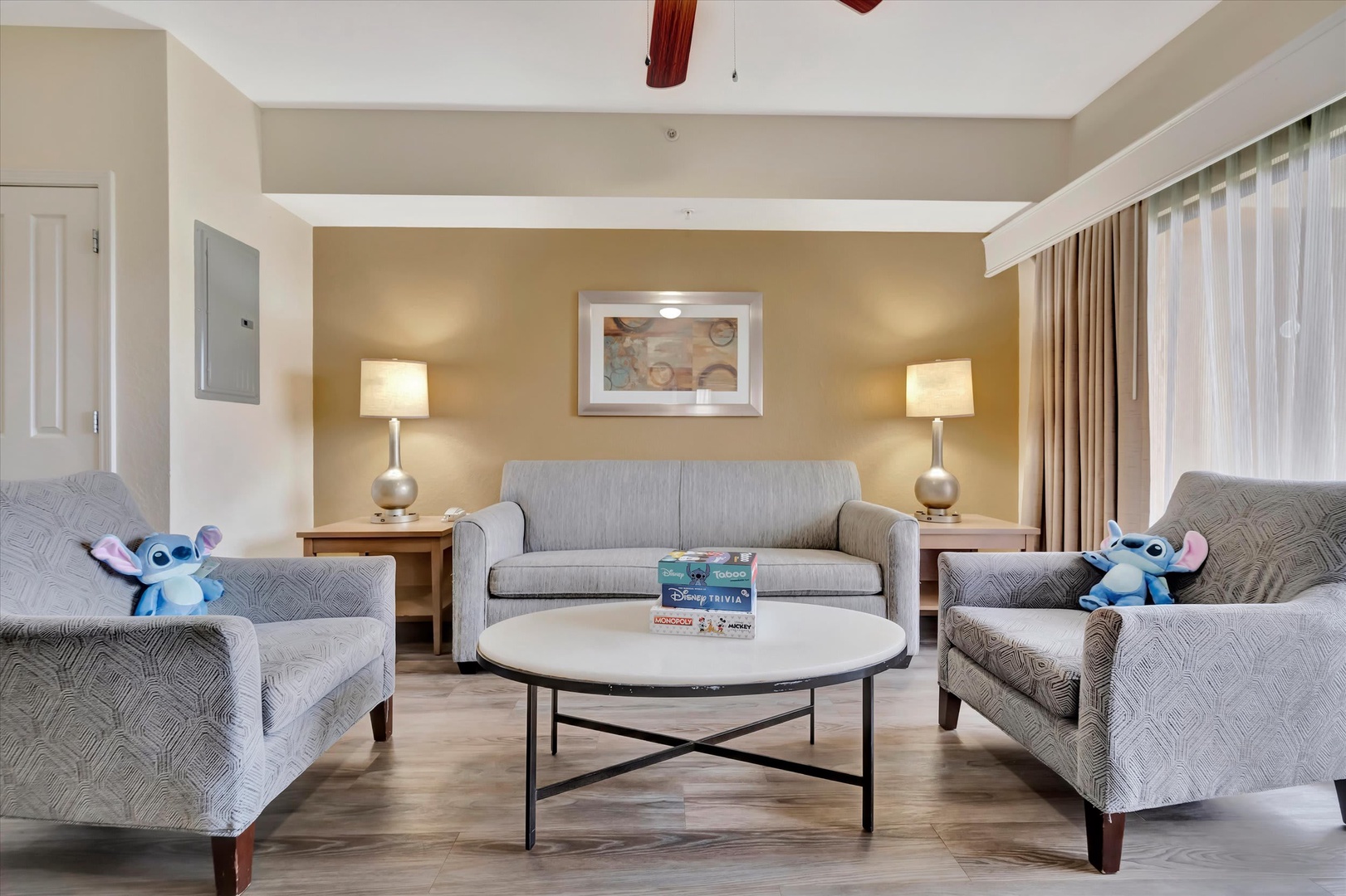 Settle into your spacious living area, complete with plush seating, warm lighting, and plenty of room to spread out. Perfect for family game nights or winding down after a day of adventure.