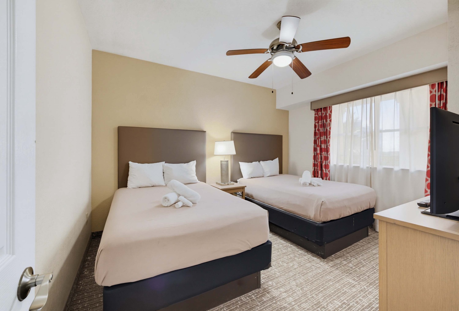Your spacious retreat with two plush beds, fresh linens, and soft natural light. Perfect for unwinding after a day of adventure.
