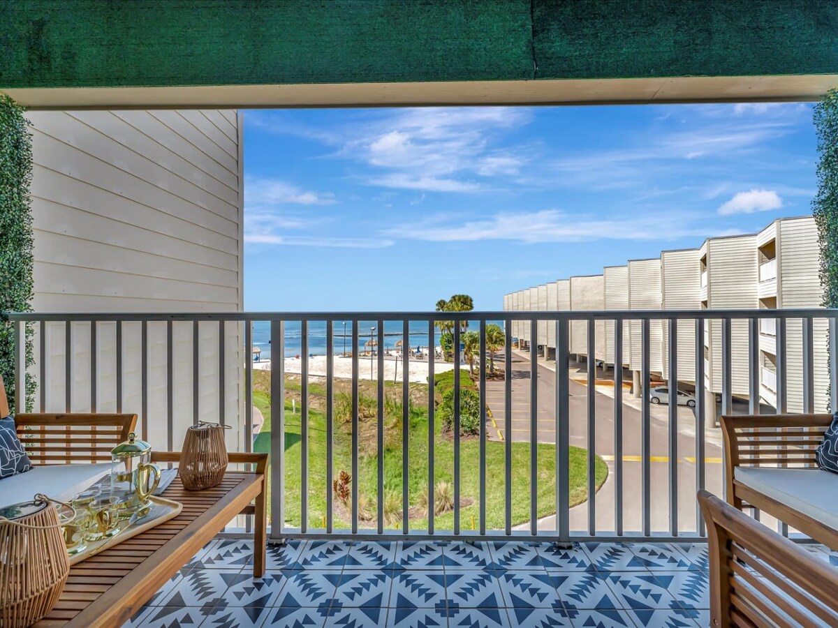 Ocean views stretch across the horizon from this private balcony, where morning coffee or sunset cocktails feel like pure relaxation. The shimmering blue water and coastal breeze set the perfect scene for unwinding.