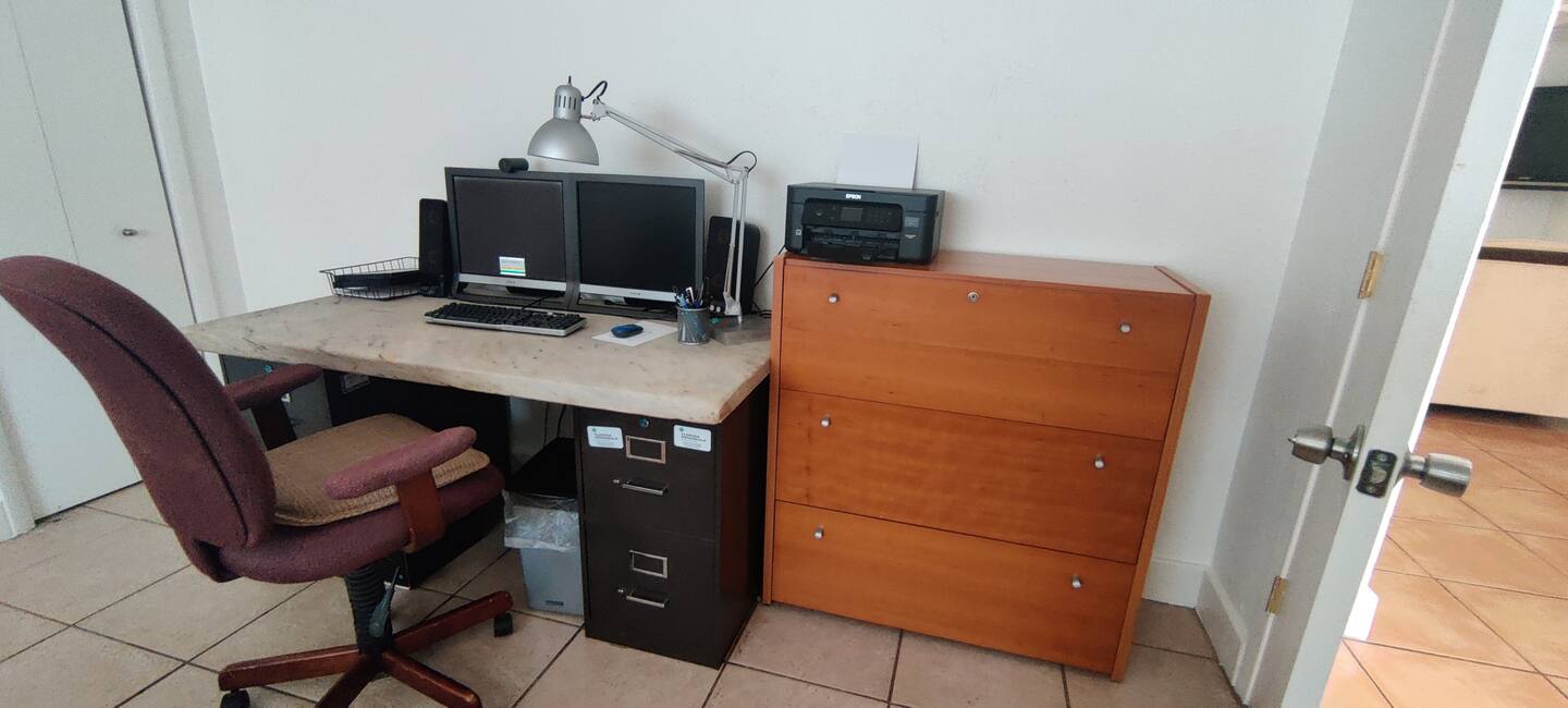 Your own dedicated workspace with a comfortable desk, chair, and dresser—perfect for catching up on work or organizing your belongings during your stay.