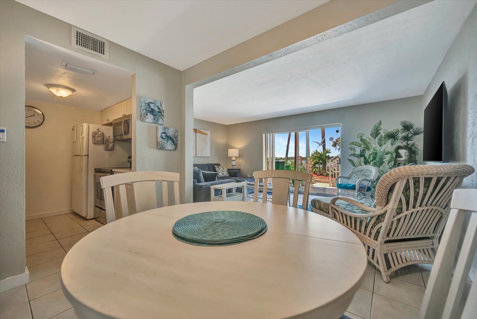 Gather around the dining table and enjoy meals with ocean breezes drifting in from your private balcony. Coastal-inspired décor and an open layout invite you to relax and unwind in style.