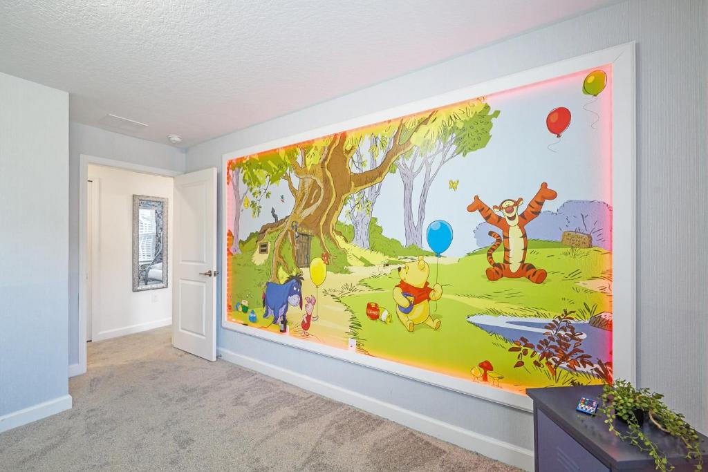This cheerful bedroom features a delightful Winnie the Pooh mural wall, perfect for creating magical memories with your little ones during your stay.