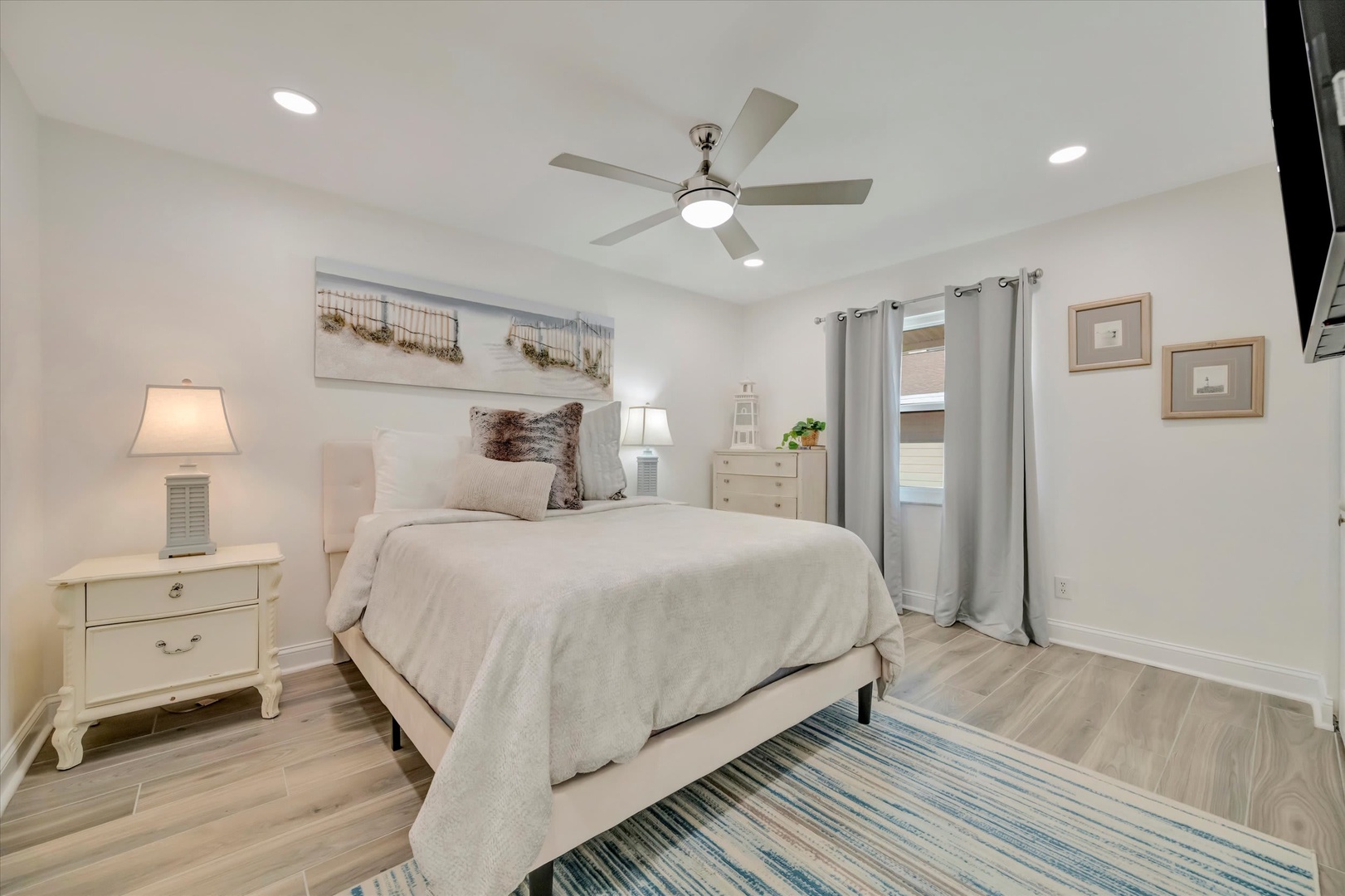Step into your serene coastal retreat featuring plush linens, soft lighting, and a calming color palette that invites you to unwind after a day of beachside adventures.