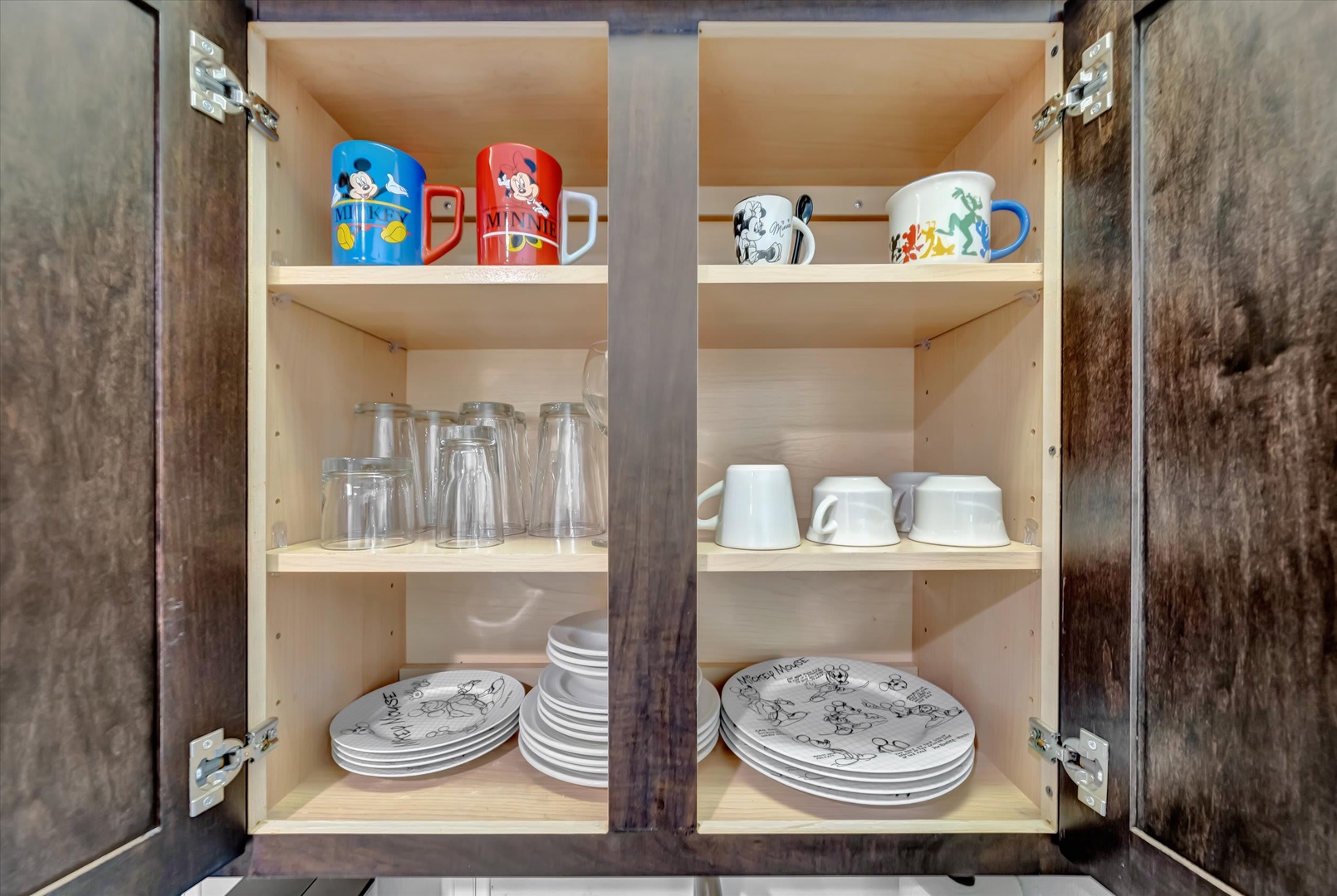 Your kitchen comes fully stocked with cheerful mugs, glassware, and dinnerware—everything you need to enjoy meals together during your stay.