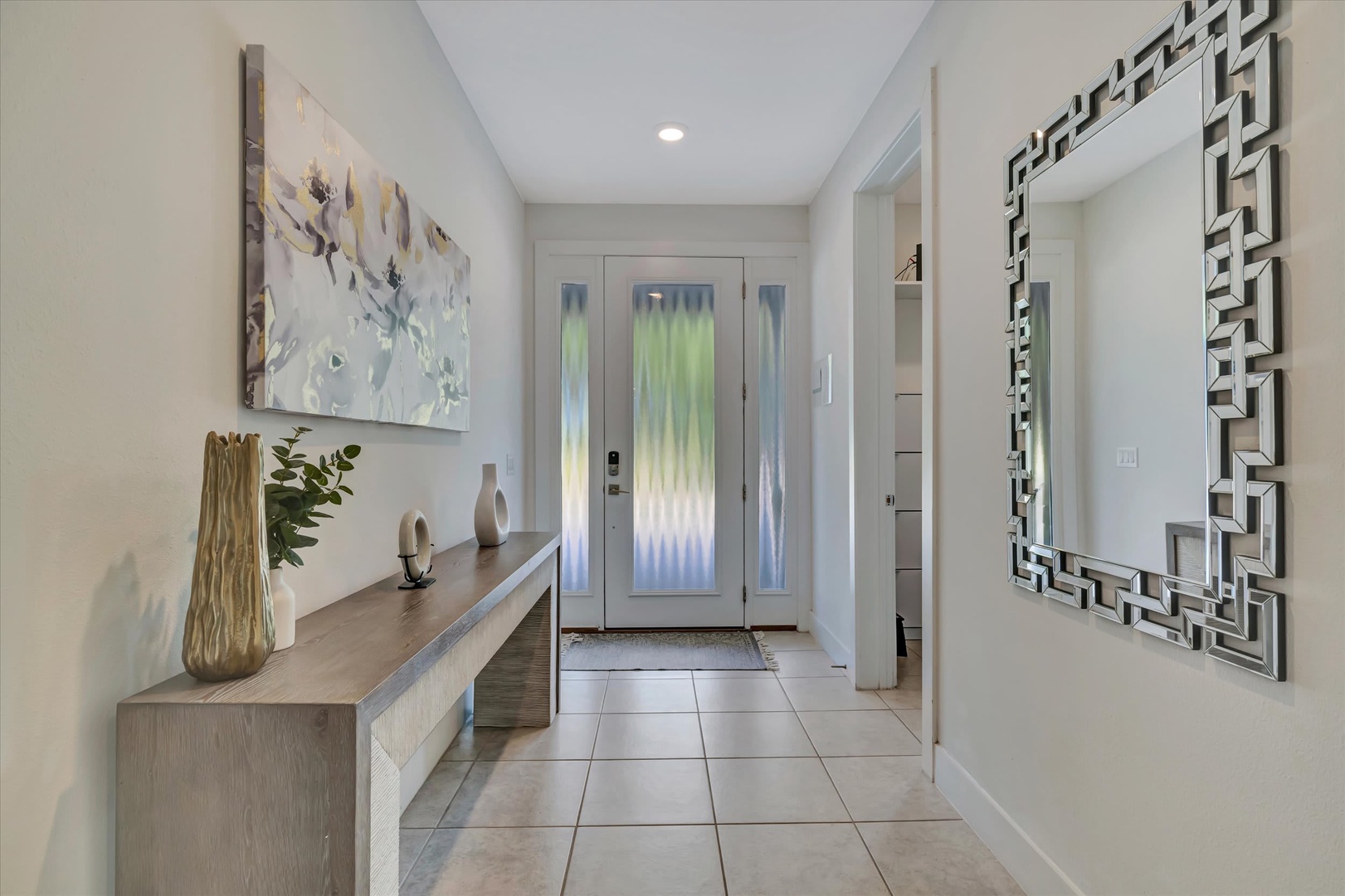 Step into your welcoming entryway, where modern style and thoughtful design greet you from the moment you arrive. Clean lines and elegant touches set the tone for your stay.
