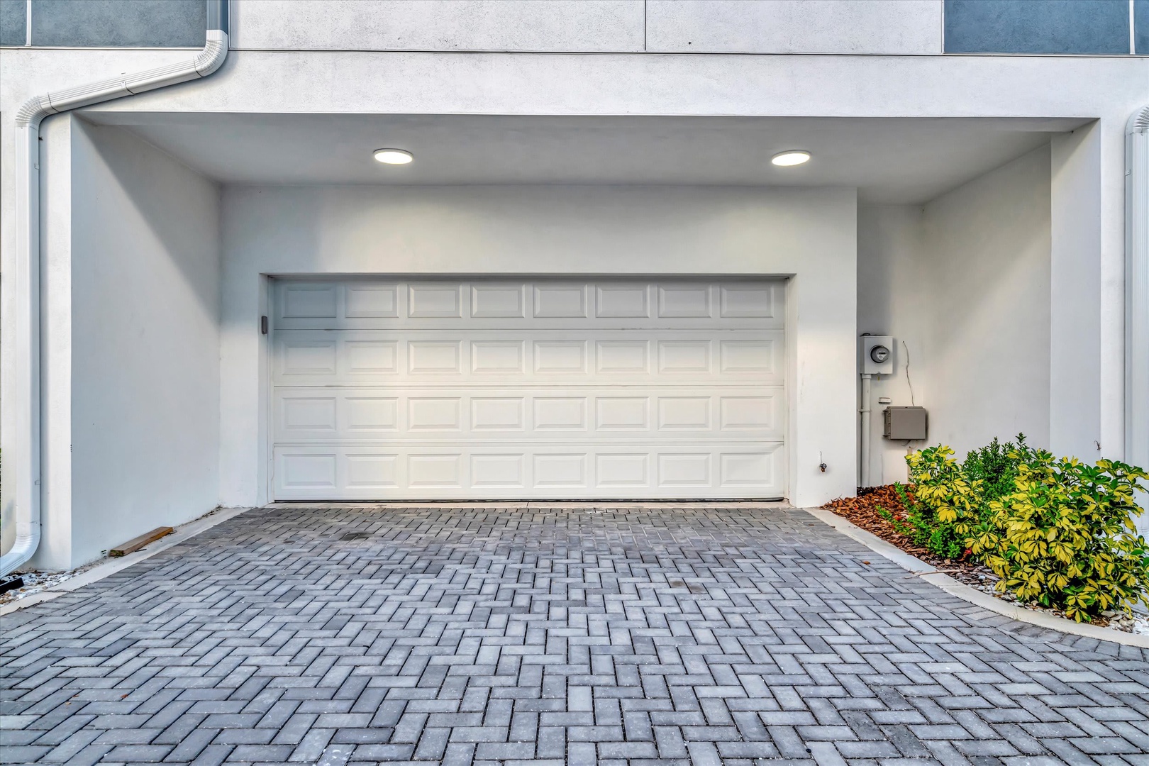 Your private garage with paver driveway offers convenient parking and easy access to your vacation rental.