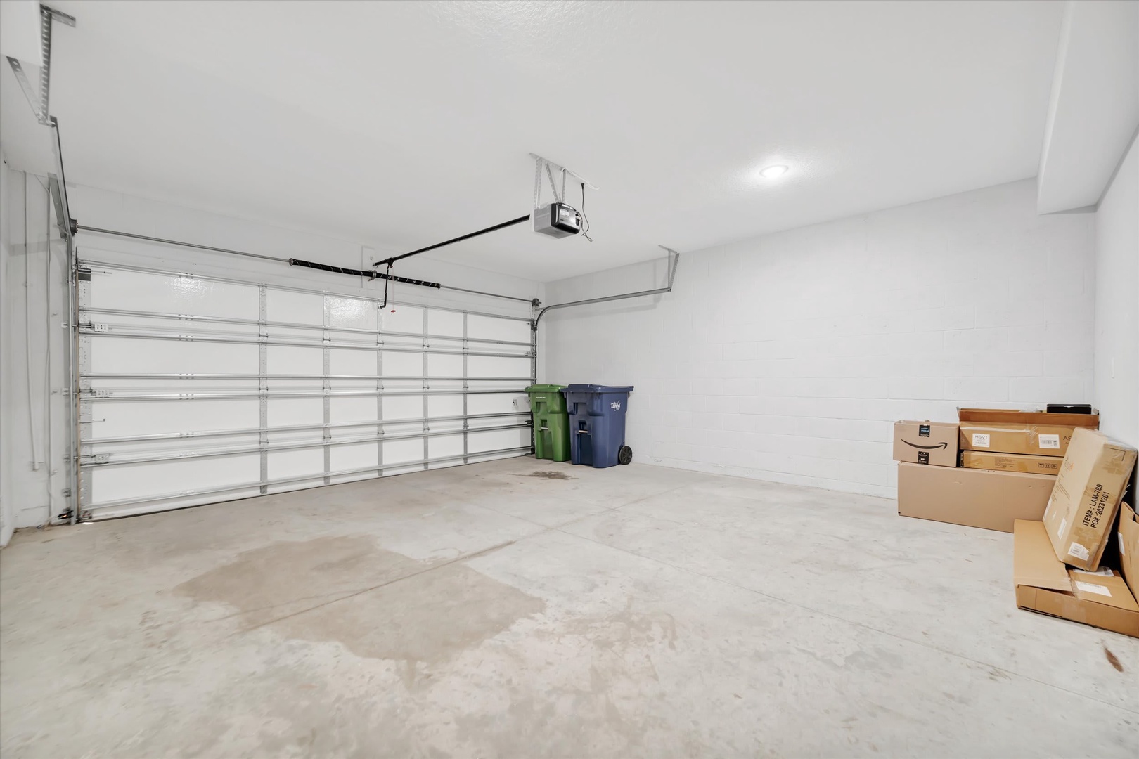 A clean, spacious garage provides plenty of room for your vehicles and gear, making arrival and storage convenient throughout your stay.