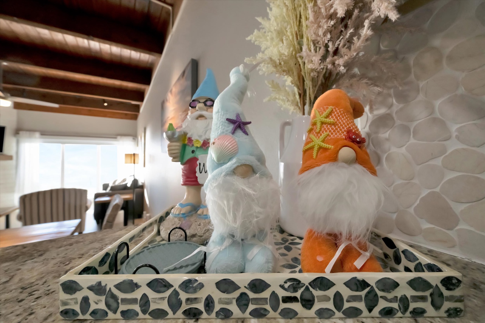 Charming beach-themed décor welcomes you to your coastal retreat, setting a playful and relaxing vacation tone from the moment you arrive.