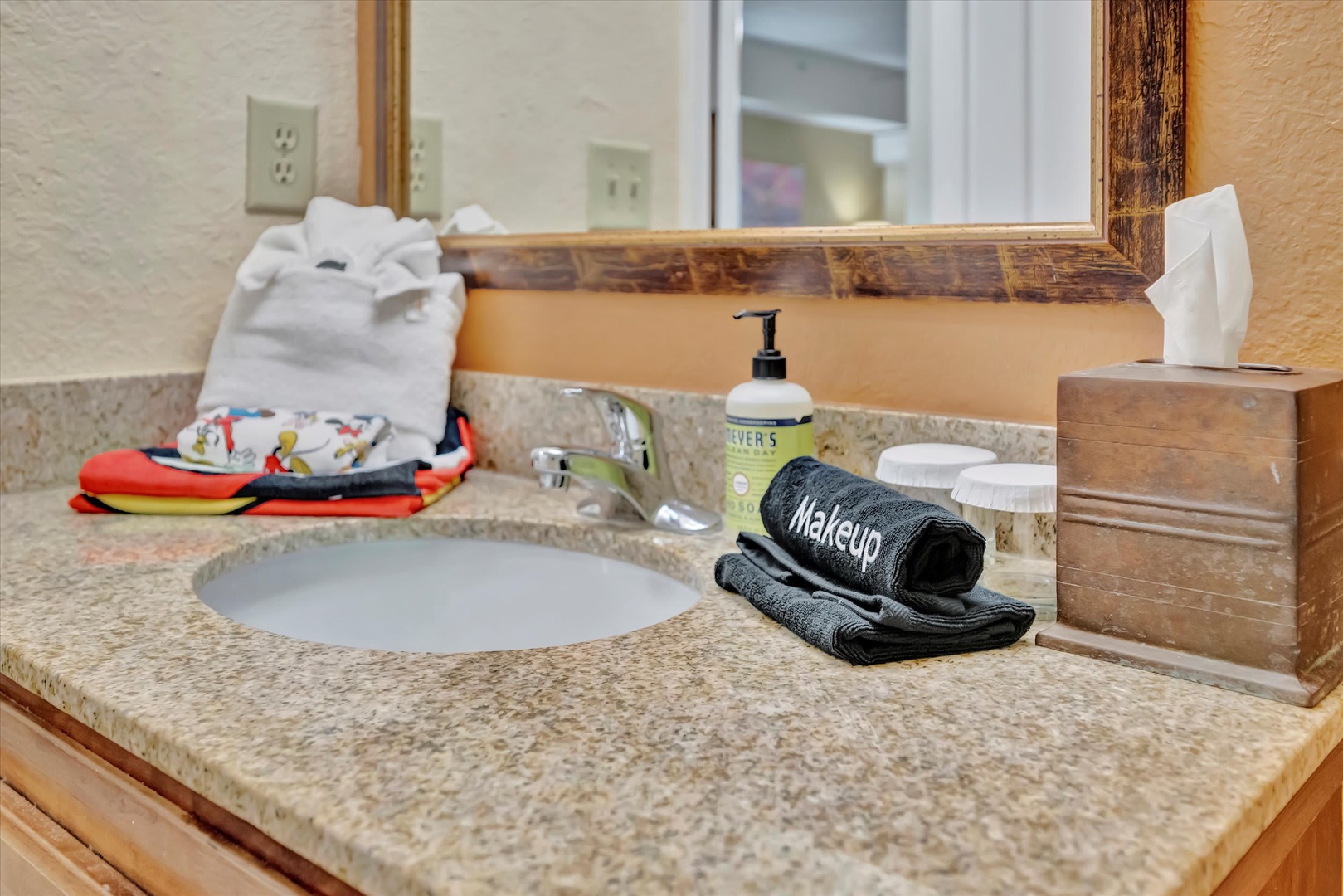 Step into your thoughtfully prepared bathroom where fresh towels, quality soap, and cozy touches await—everything you need to feel right at home.