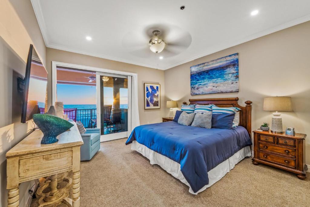 Wake up to stunning ocean views from your private balcony, where the soothing blues of the sea meet your serene coastal retreat. This inviting bedroom blends comfort and style, perfect for unwinding after a day of exploring.