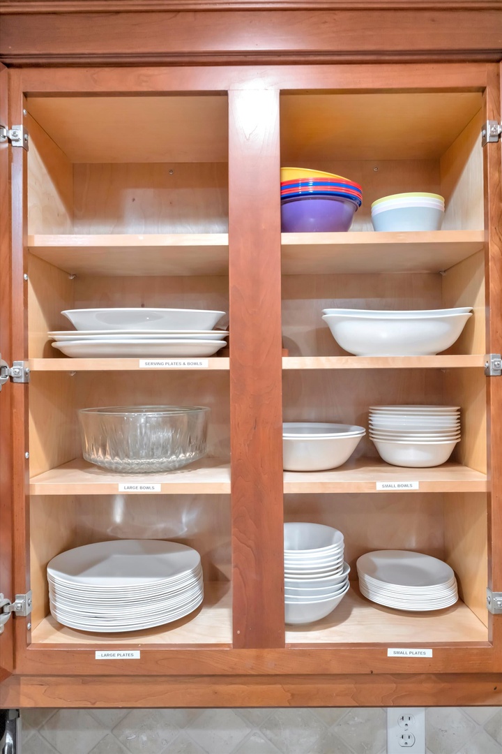 Everything you need to prepare and serve your favorite meals is thoughtfully organized and ready for you in this well-stocked kitchen cabinet.