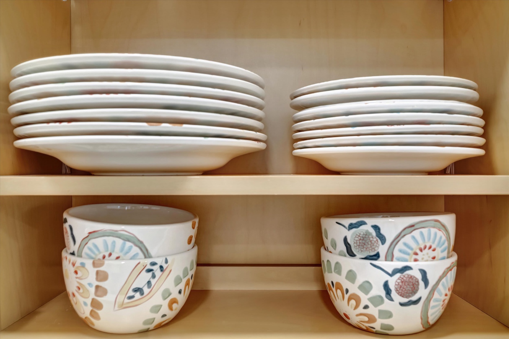 Your kitchen comes fully stocked with plates and beautiful hand-painted bowls, making it easy to whip up a quick breakfast or enjoy a home-cooked meal together.