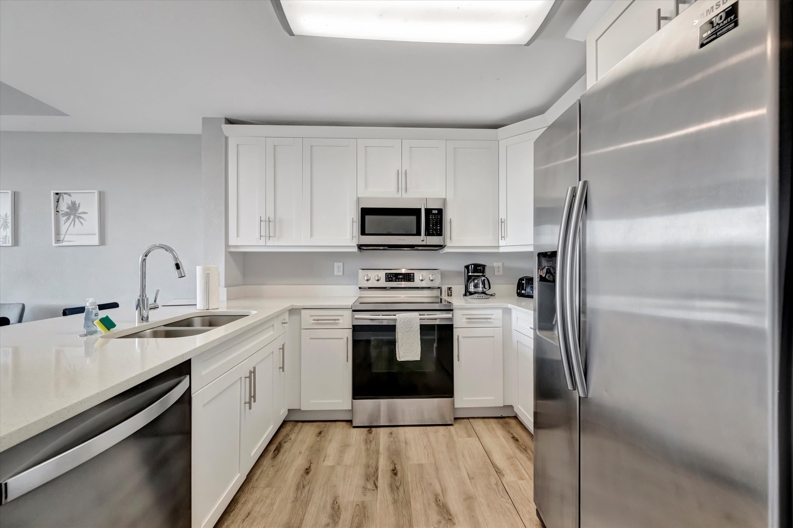 Whip up your favorite meals in this bright, fully equipped kitchen with sleek stainless appliances and plenty of counter space for all your culinary adventures.