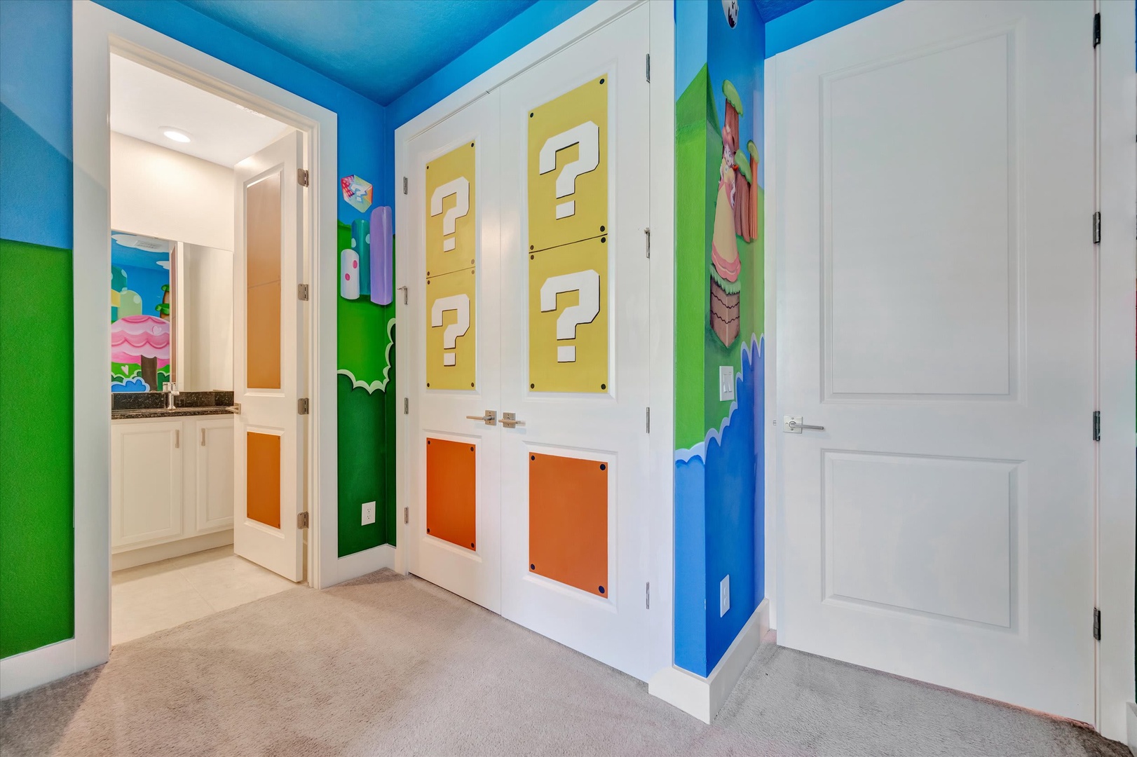 Step into a vibrant, whimsical retreat where bold blue and green walls meet playful themed accents. Your adventure awaits in this imaginative space with private ensuite access.