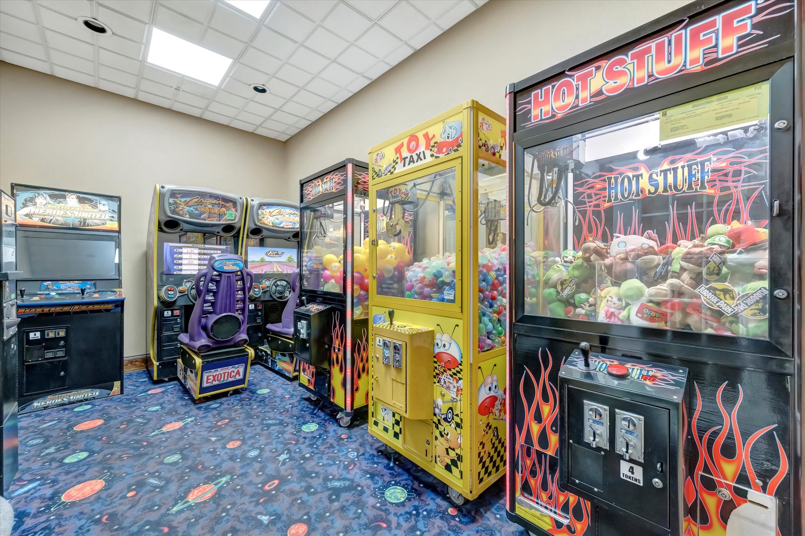 Challenge yourself to a claw machine or try your luck at classic arcade games in this bright, fun-filled game room—perfect for some friendly competition.