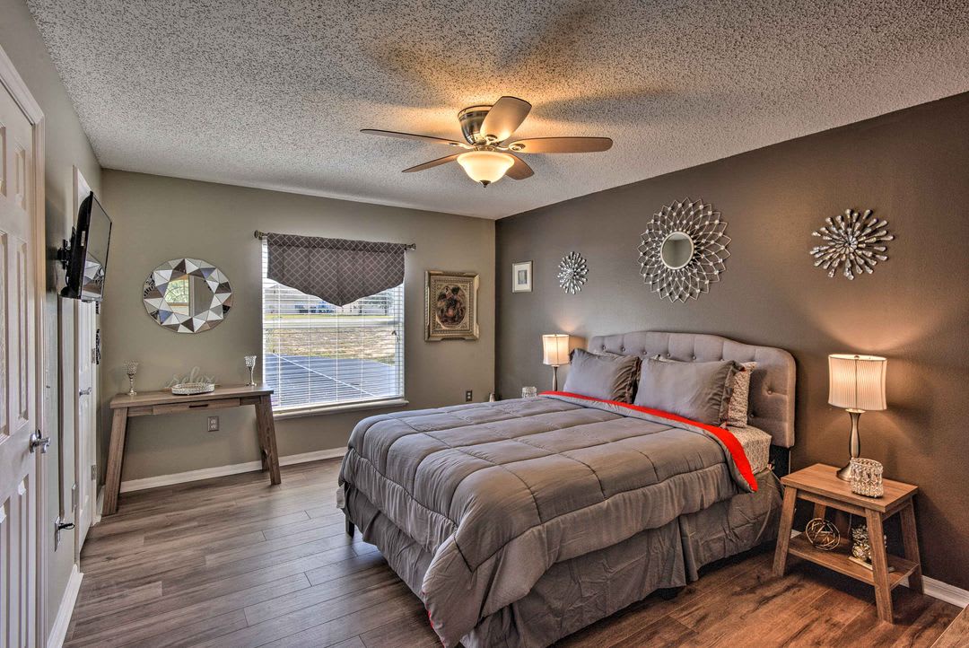 Unwind in your peaceful bedroom with plush bedding, warm lighting, and tasteful décor that invites restful nights and refreshing mornings.