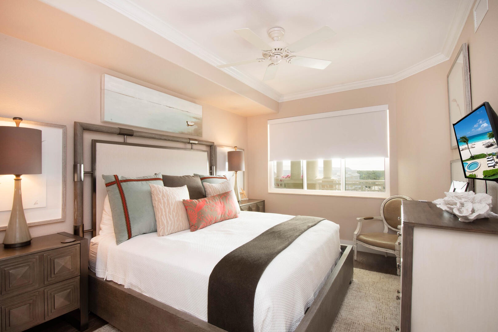 Guest Suite #2 with queen bed and large window for sunlight.