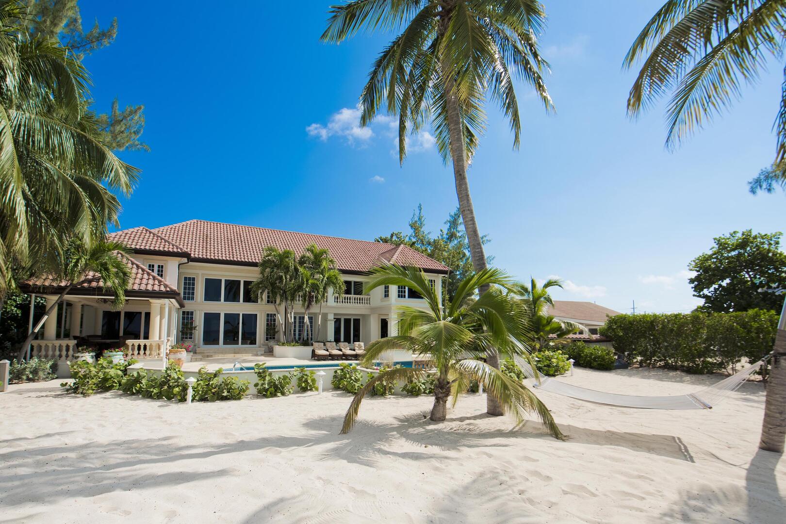 Welcome to Coconut Walk, an oceanfront estate on Seven Mile Beach.