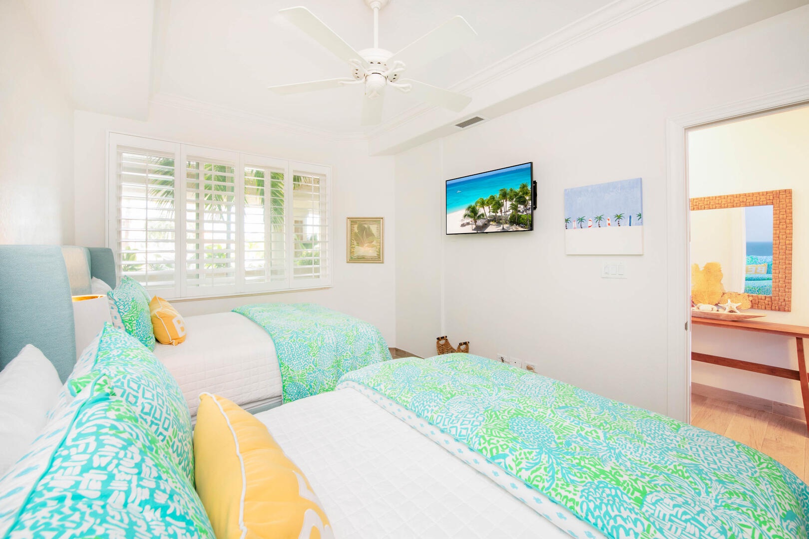 Guest suite with two queen beds.