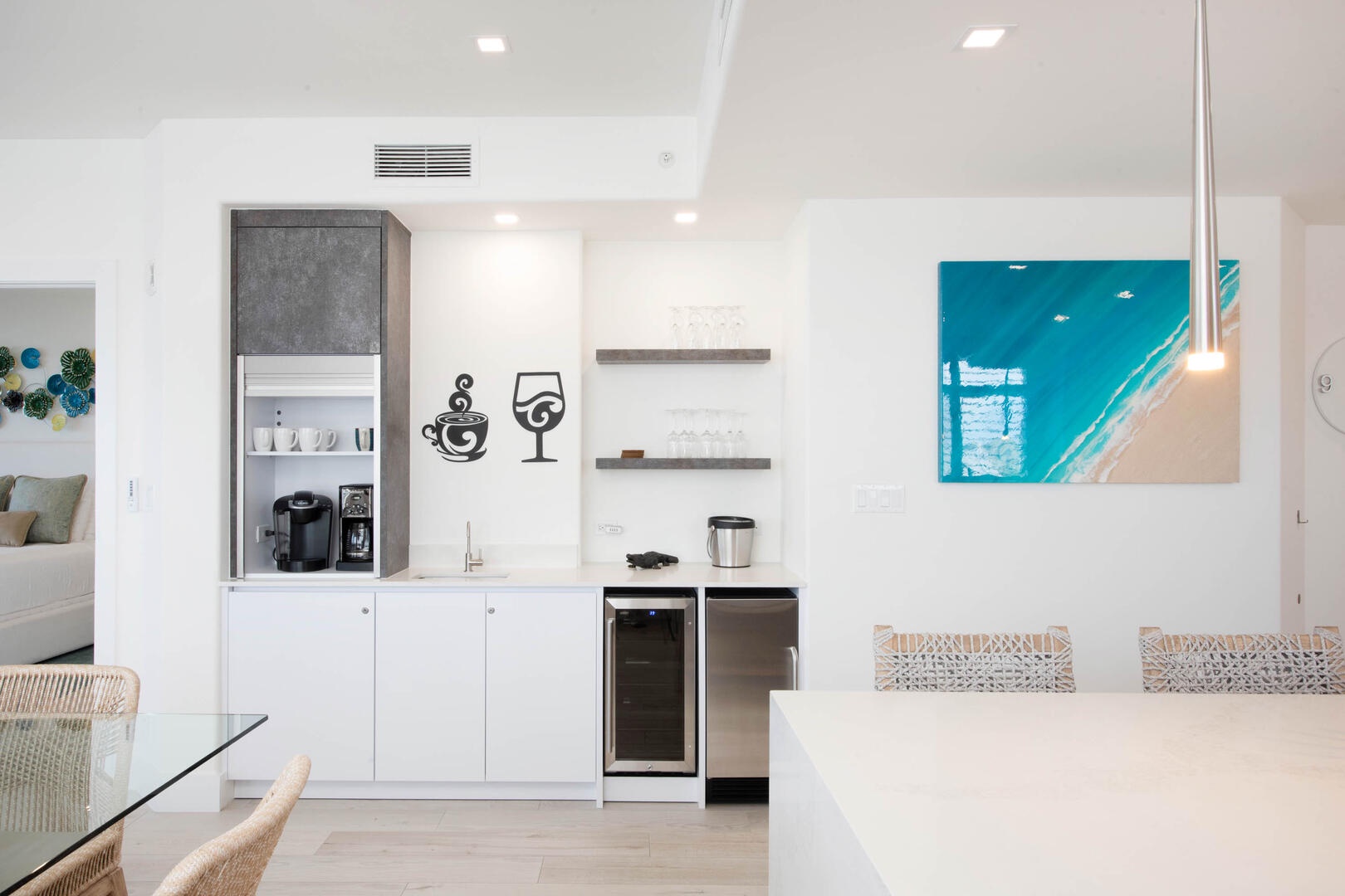 Coffee station and wet bar opposite the dining area.