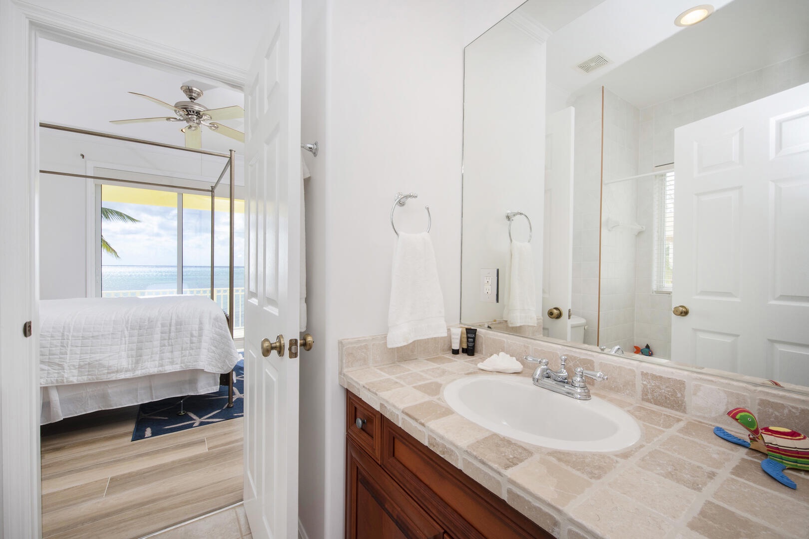 The Jack & Jill bathroom is shared by both the Guest Bedroom and Twin Bedroom.