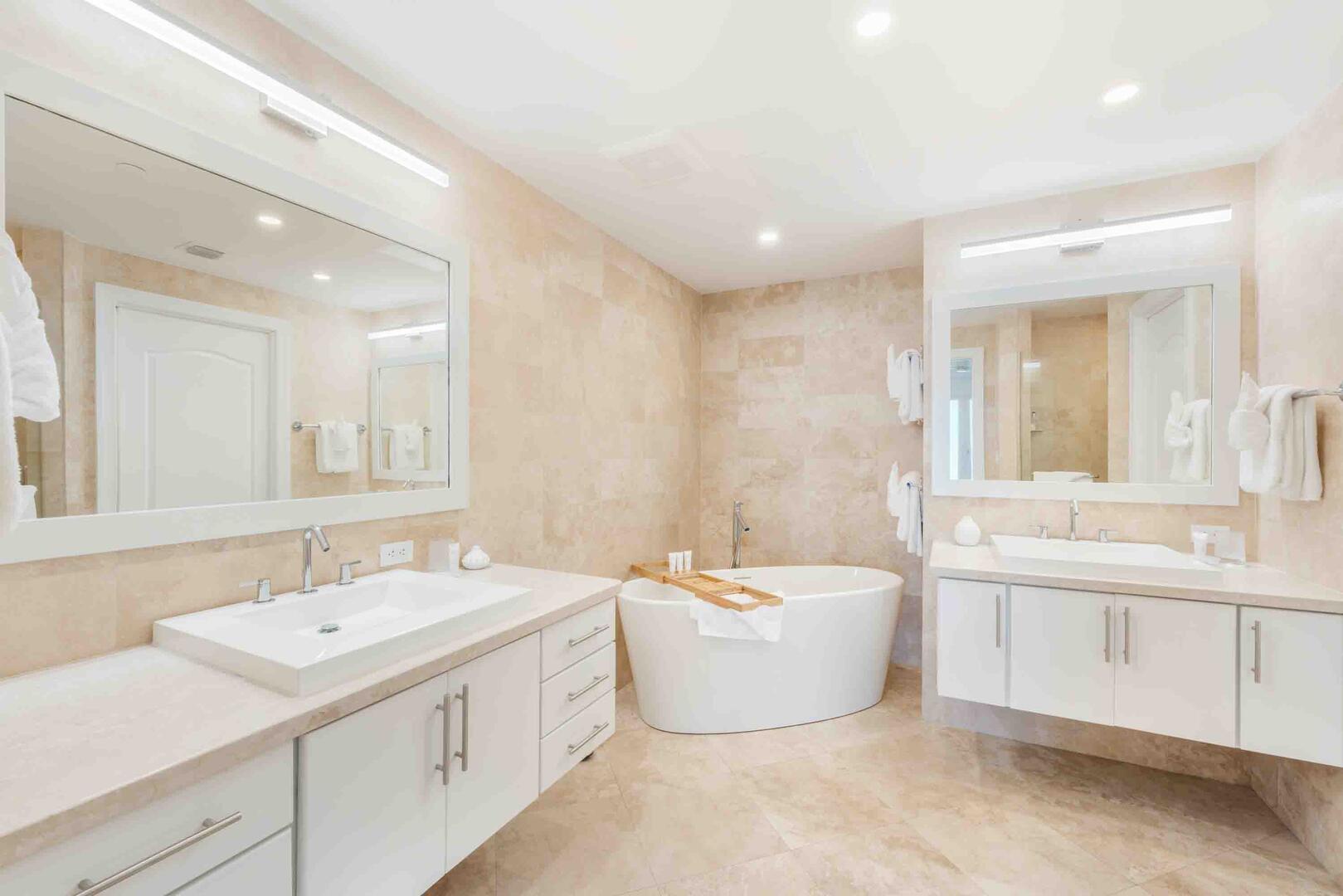 Primary Ensuite with dual vanity, soaking tub, and separate shower.