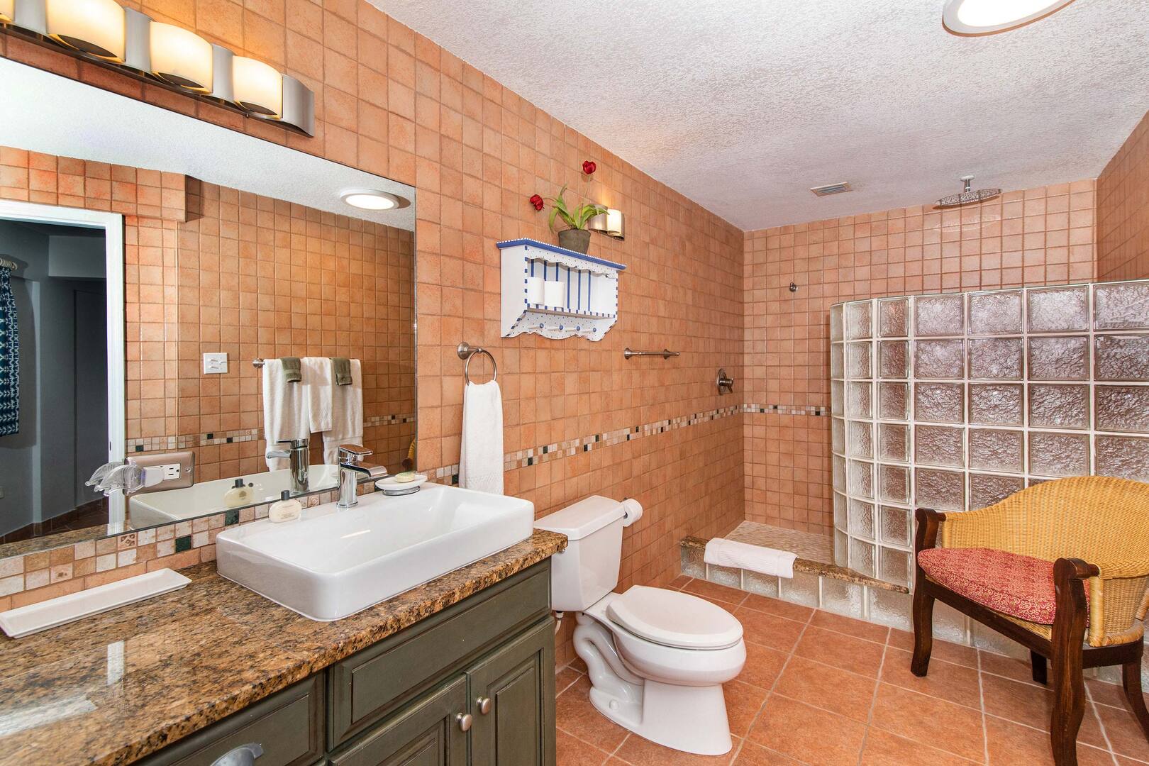 South suite bathroom with shower.