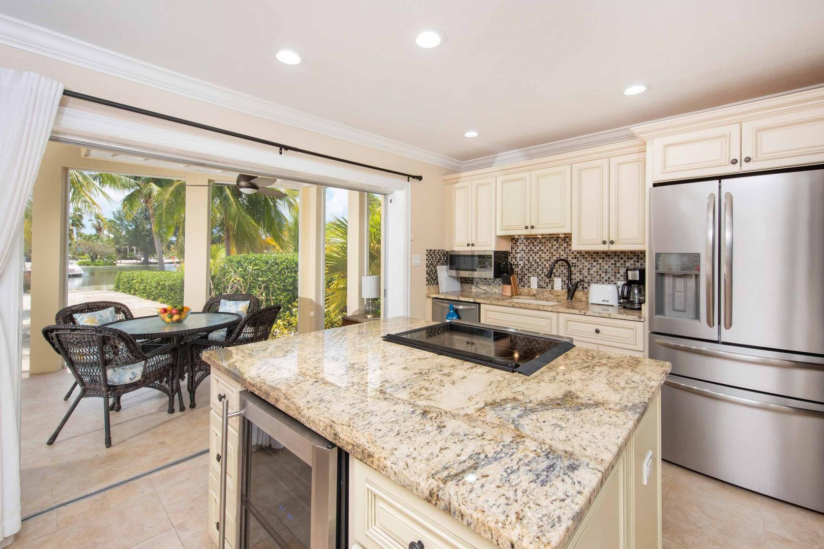 Full kitchen with modern appliances.