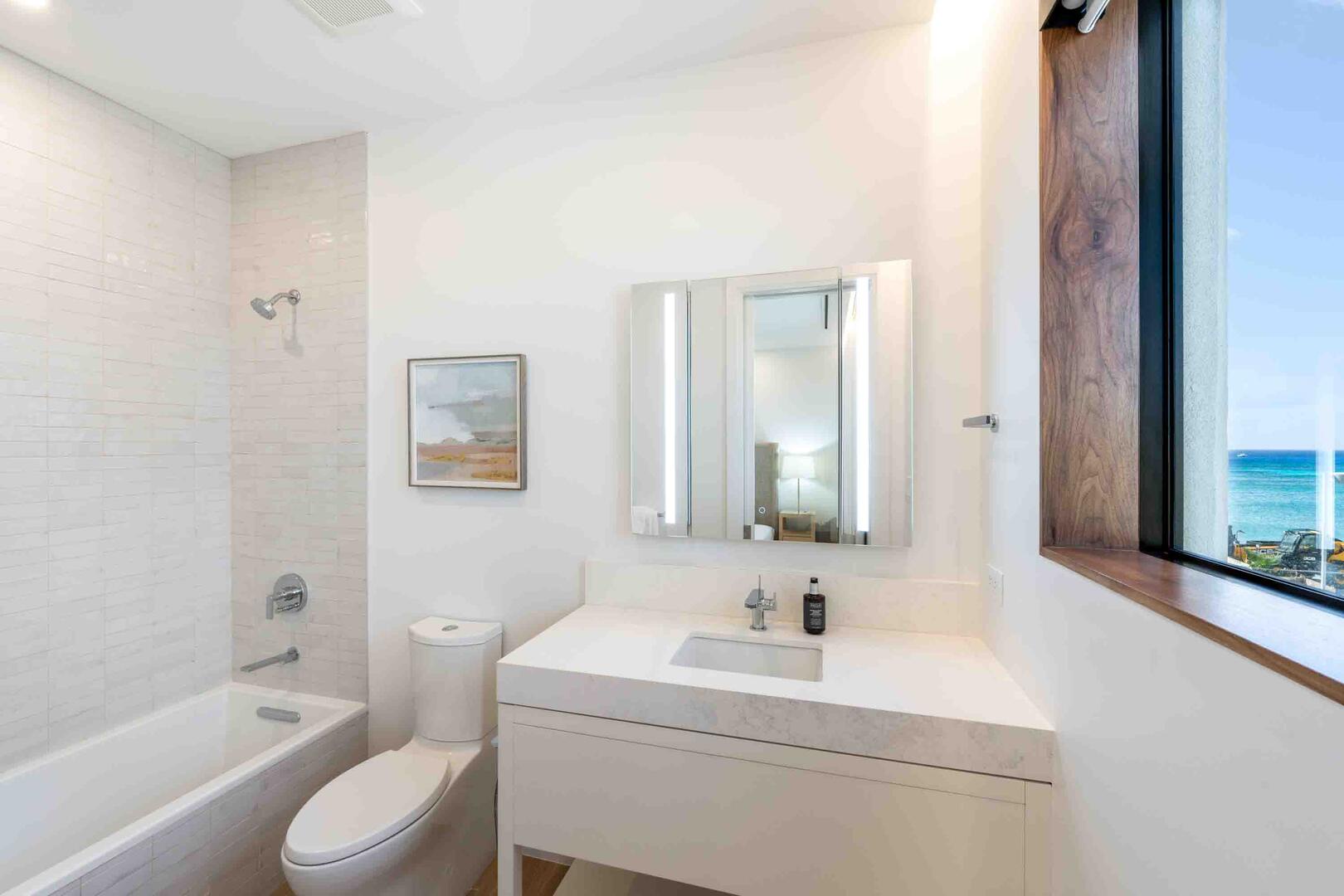 Bedroom 2 Ensuite equipped with a shower bath.