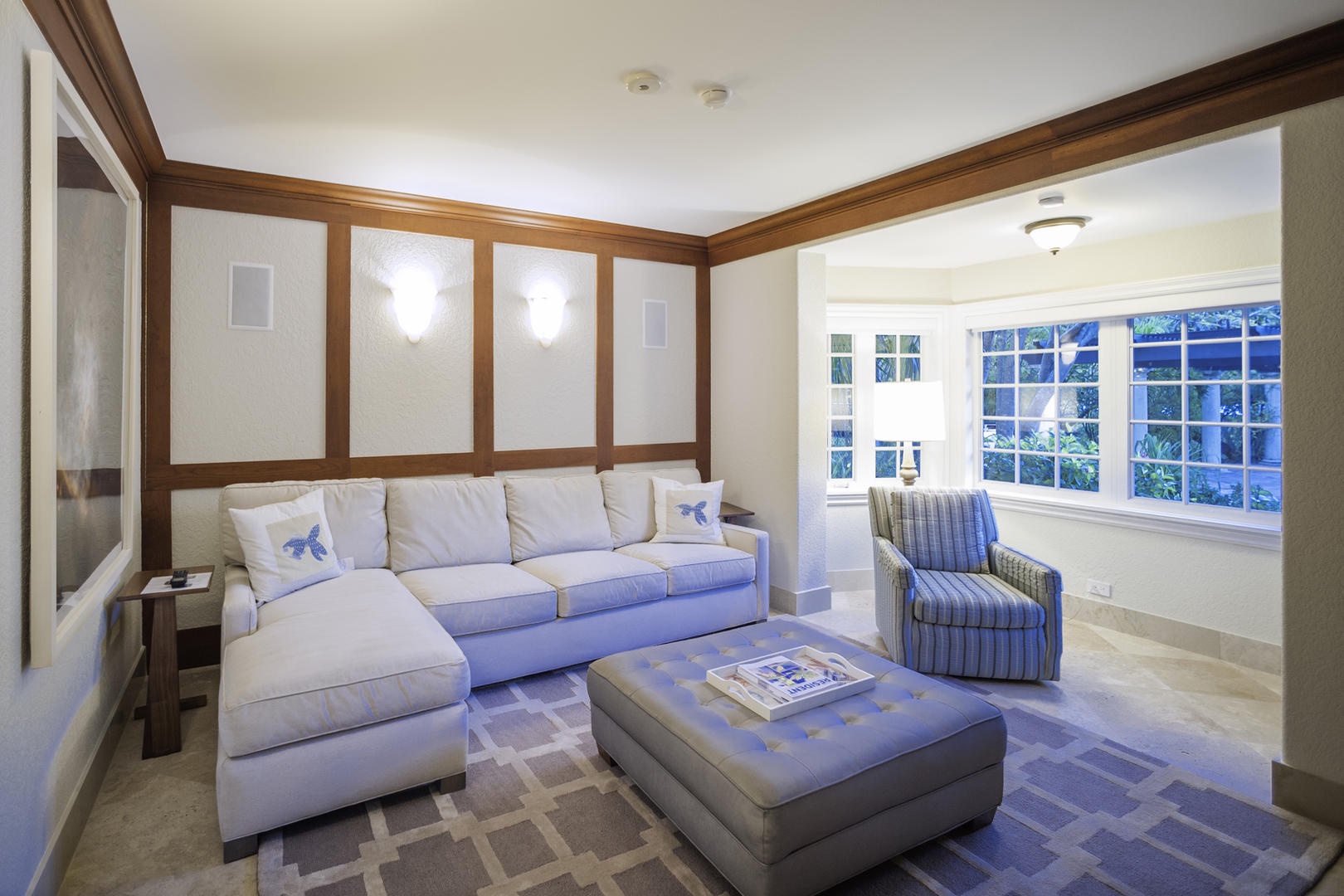 A closer look at the cozy couches in the media room.